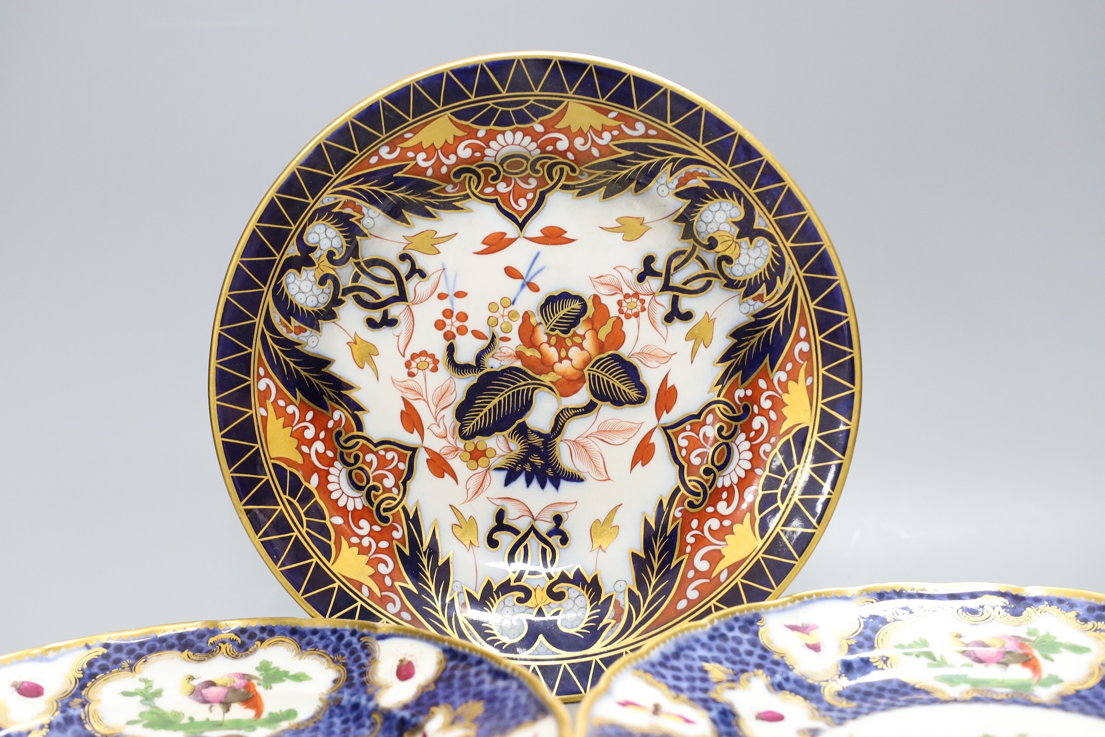 A pair of blue scale plates and an English Imari plate, 22cm